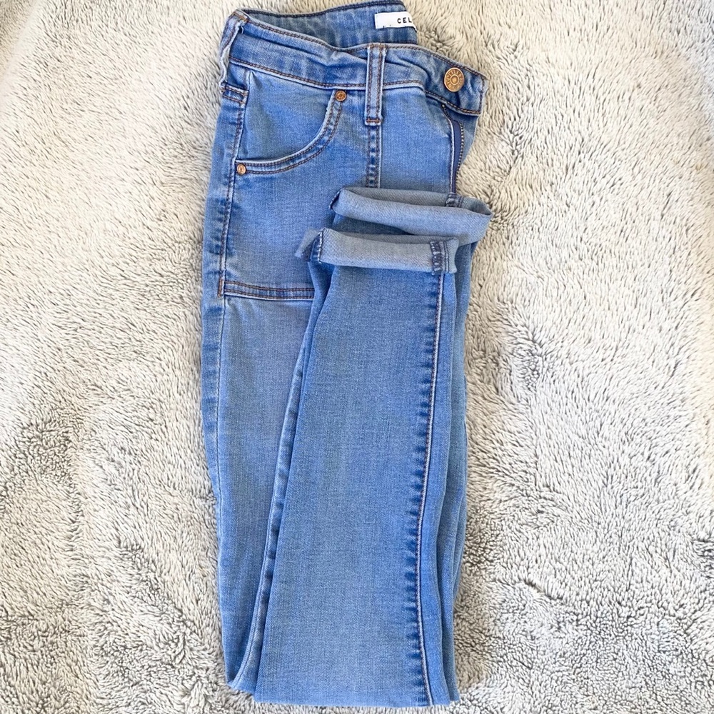 Light wash high rise ankle skinny jeans